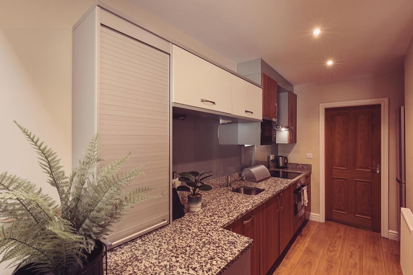 فندق لونغلاندس إن آند كوتيدجيز كارنفورث المظهر الخارجي الصورة A kitchen